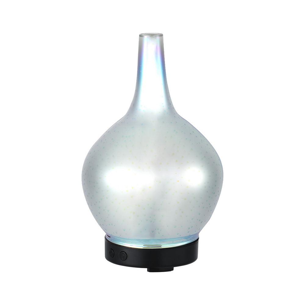 Pearl glass aroma diffuser with black base, modern home decor accessory on white background